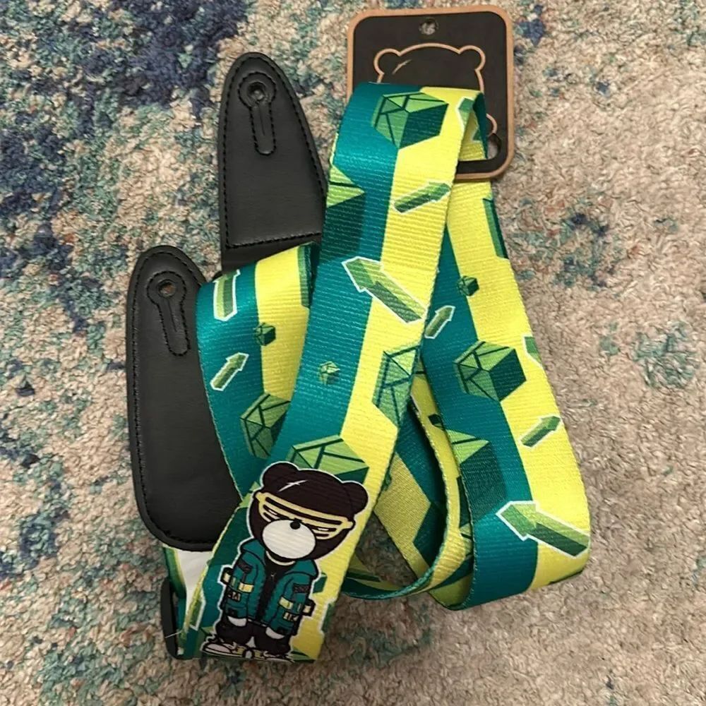 NWT  IKARIKUMA Angry Little Black Bear Guitar Strap leather ends